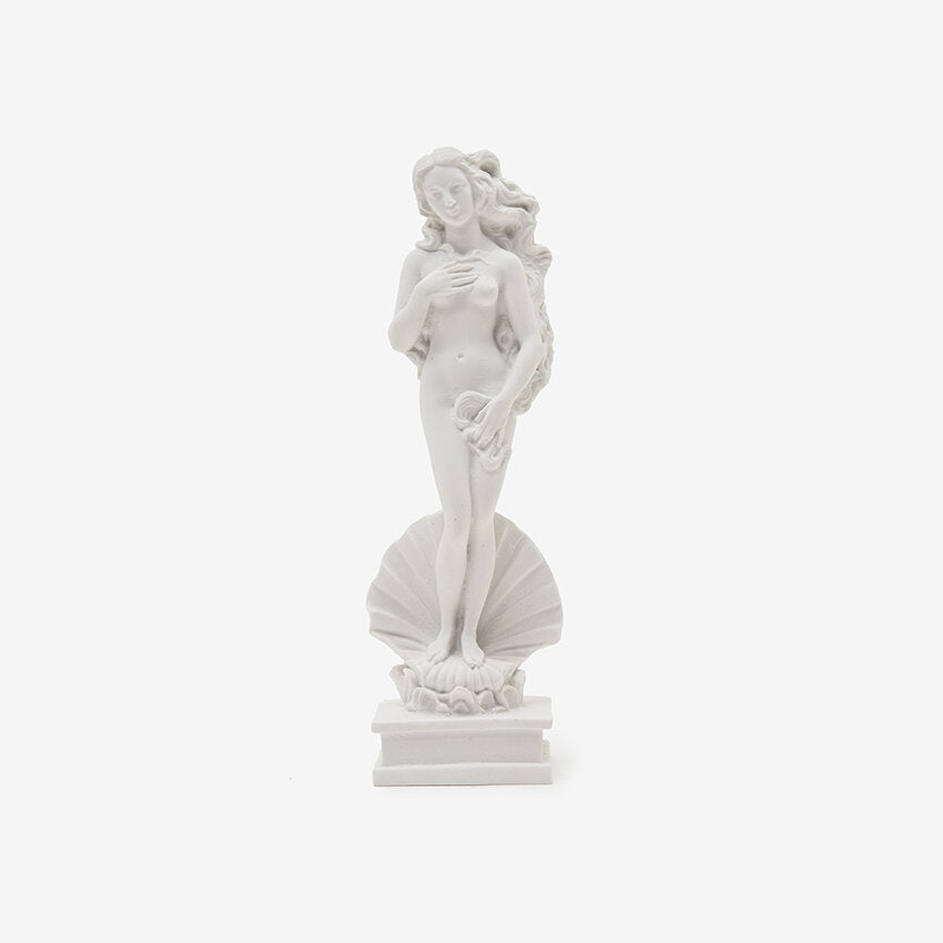 Poly and/or ceramic figurine
